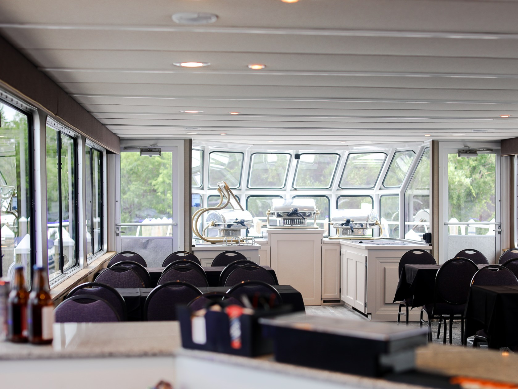 a room filled with furniture and a large window